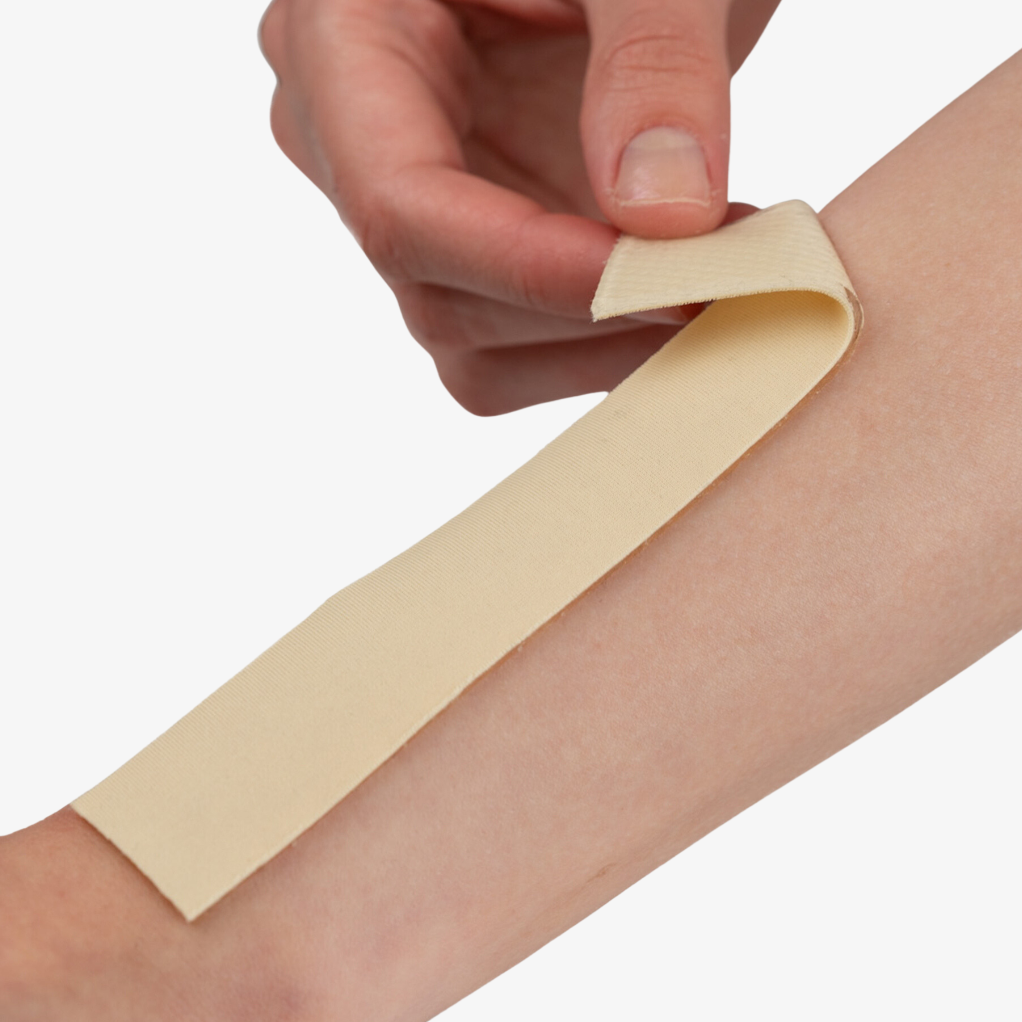 Advanced Medical-Grade Silicone Sheet Areola 1" x 6" strips on caucasian women's arm | beige