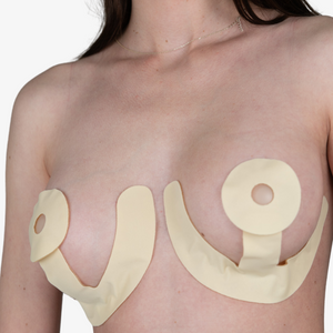 Advanced Medical-Grade Silicone Breast Kit on caucasian women's breast close up | beige