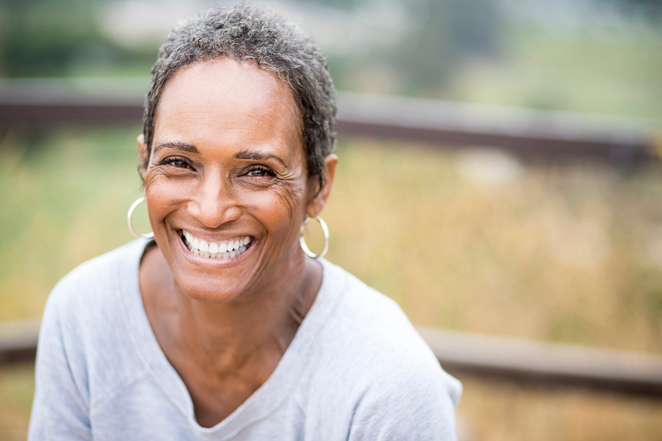 Black lady who is happy and confident smiling 